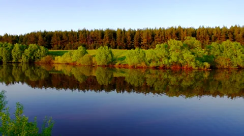 Riverbank at the sunset Video stock 24234737