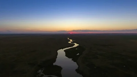 Riverbed at sunset. View from above. Idyllic path Видео 74192746