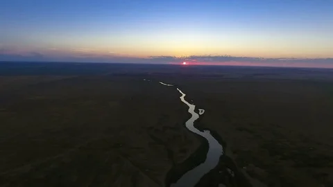 Riverbed at sunset. View from above. Idyllic path Видео 74193035