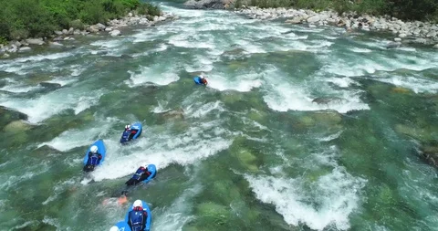 Riverboarding on alpine valley Stock Footage 110785203