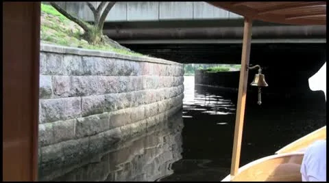 The riverboat passes under the bridge - a long shot Stock Footage 10682829