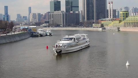 A riverboat is sailing down the river. The beginning of river navigation. Stock Footage 186717986