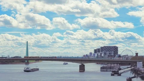 Riverboats Beneath Deutz and Severin Bridges in Cologne Stock Footage 345653607