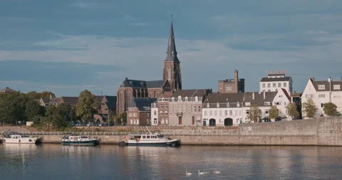 Riverfront with Church Spire 8K Stock-Footage 343737913