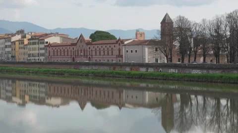 Riverfront in Pisa, Italy - Static Cityscape Reflection. Stock Footage 329960043