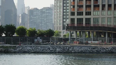 Riverfront urban construction Stock Footage 243811455