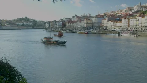 Riverfront view with boats and old buildings Stock Footage 327688697