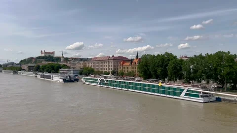 A riverfront view of Bratislava, Slovakia, featuring the Danube River 스톡 동영상 301540422