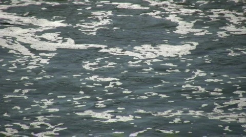 River's surface is foamy as it flows (High Definition) Stock-Footage 364931
