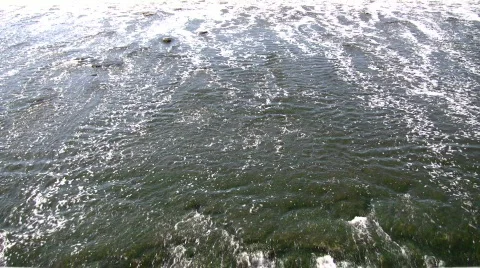 River's surface is turbulent, creating white water rapids (High Definition) Video stock 364929