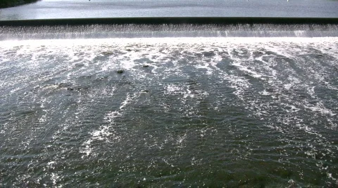 River's surface is turbulent, creating white water rapids (High Definition) Stock-Footage 364930