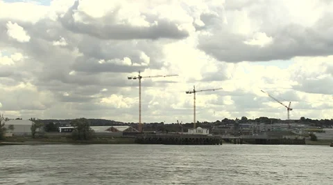 Riverside Construction Cranes Tracking Shot Stock Footage 43424685