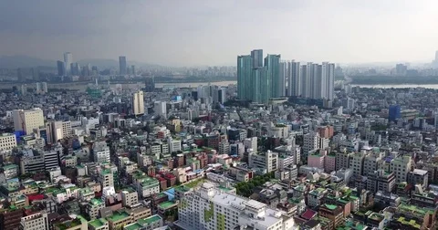 Riverside High Rises and Hazy Skyline Above Western Seoul Stock-Footage 78702669