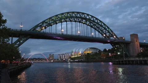 Riverside of the River Tyne with the Tyne Bridge at twilight Stock Footage 133566237
