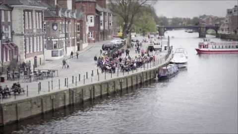 Riverside Seating Area Time-lapse with Boat Turning in York UK Video stock 74596522