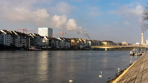 Riverside Skyline of Basel along the Rhine, Switzerland, Winter Stock Footage 343349931