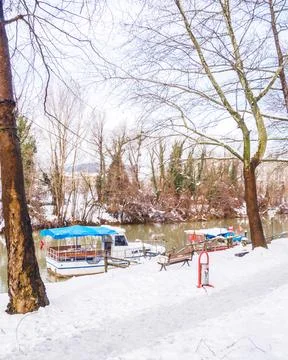 Riverside in the snow in winter Stock Photos