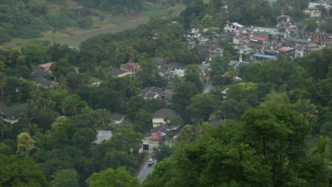 Riverside town and winding river with road through tropical forest, Sri Lanka Stock Footage 330882582