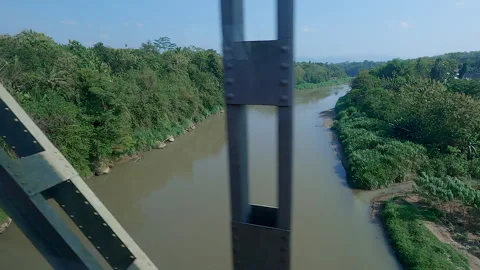 Riverside view from train window Stock Footage 206950615