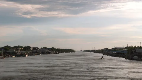 A riverside village at evening. Stock Footage 159324806