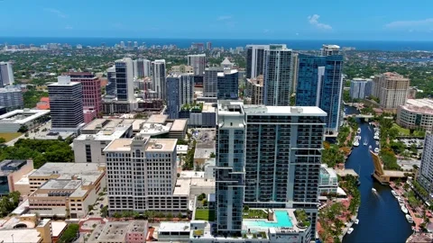Riverwalk Aerial Turn with Ocean Ft Lauderdale Stock Footage 248394033
