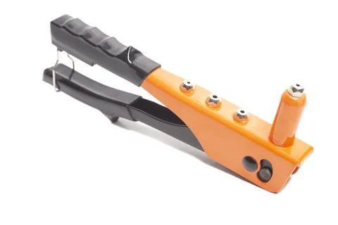 Rivet gun isolated on white background. Stock Photos