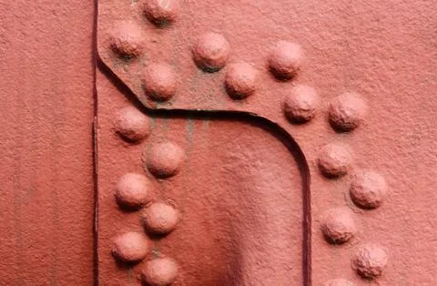 Riveted metal wall surface Stock Photos