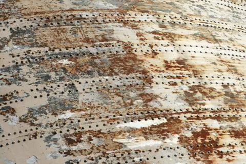 Riveted rusty metal background Stock Photos