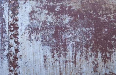 Riveted rusty metal background Stock Photos