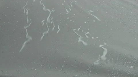 Rivulets of rain on a gray tarp Stock Footage 42853552