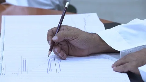 Riyadh Business - hand on paper Stock Footage 82726565