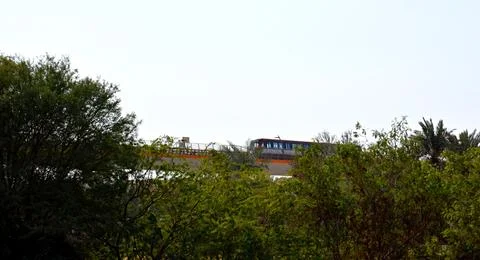 Riyadh Metro passes through the trees Stock Photos