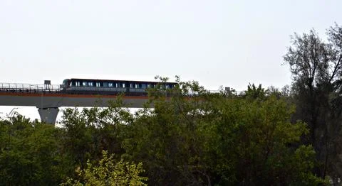 Riyadh Metro passes through the trees Stock Photos
