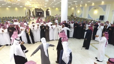 Riyadh Saudi Arabia 11-29-2022 Saudi Arabian men traditional group dancing Stock Footage 229807318