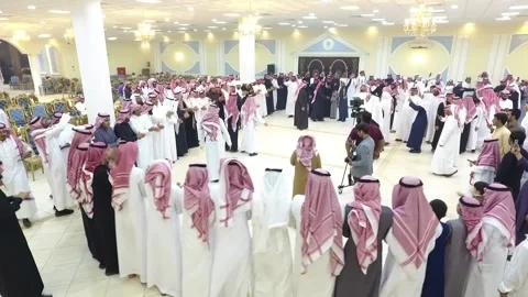 Riyadh Saudi Arabia 11-29-2022 Saudi Arabian men traditional group dancing Stock Footage 229807323