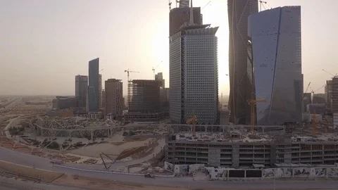 Riyadh, Saudi Arabia  Skyscraper Drone Shot with sunset orange sky Stock Footage 93345815