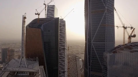 Riyadh smooth drone flight through skyscrapers Stock Footage 93345888