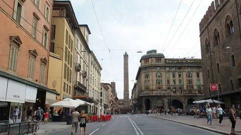 Via rizzoli with view of famous tower Stock Footage 70614716