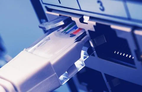 RJ 45 Cable Inserted Into Server Machine Stock Photos