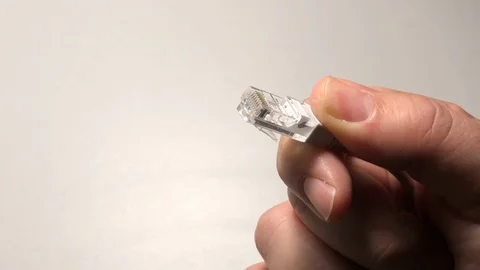 Rj45 connection ethernet cable hand Stock Footage 122103133