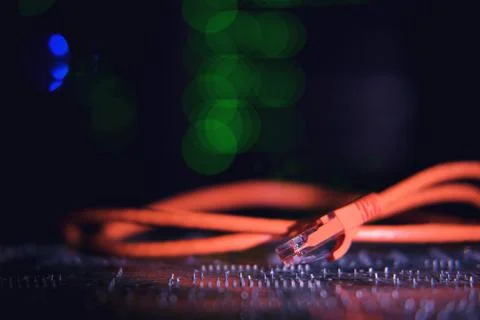 RJ45 twisted pair wire on the background of computer technology in the server 写真素材