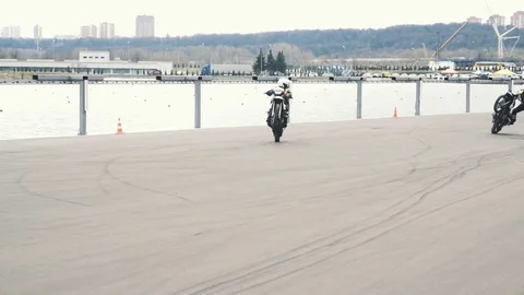 RMS stunts two bikers Stock Footage 75234829