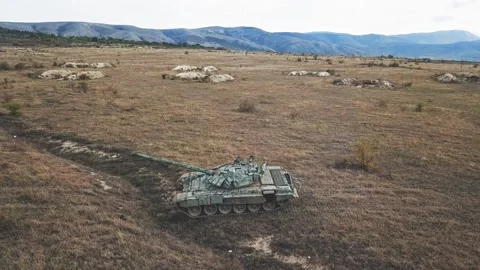 Rmy tanks rides on the mountains Stock Footage 141306319