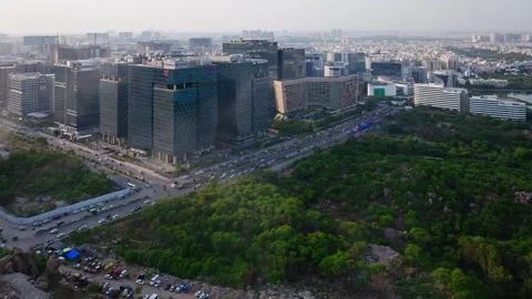 RMZ Nexity tower buildings with Gowra Palladium, ITC Kohenur, knowledge city Stock Footage 344289539