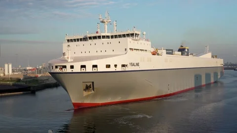 The Ro-Ro cargo ship Ysaline departs the harbour of Rotterdam 動画素材 274850924