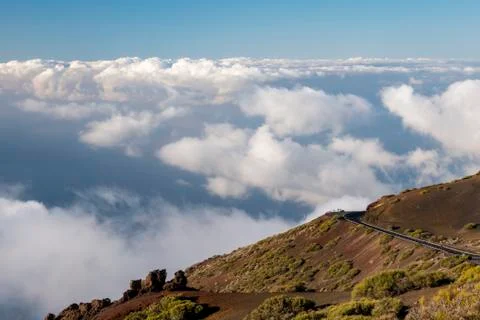 Road above the clouds Stock Photos