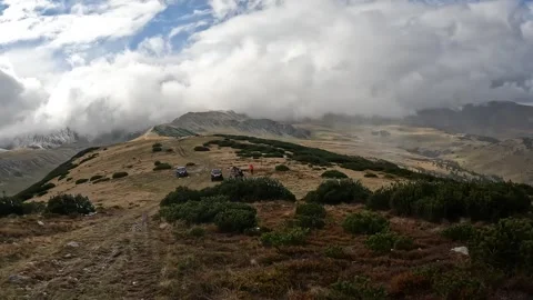 Off-Road Adventure in the Mountains with UTV SSV on a Rugged Terrain Stock Footage 293480316