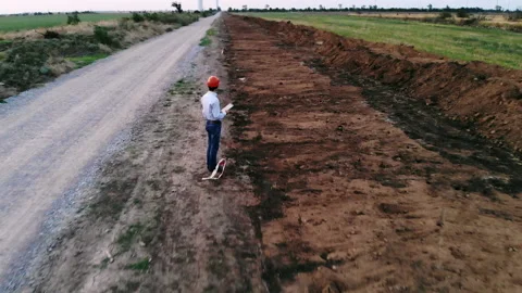 The road against the background of an electric wind generator 動画素材 235717320