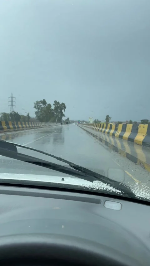 The road ahead is blurred by rain, but the journey continues Stock Footage 304280119