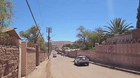 Road along Adobe Wall with Palms, San Pedro de Atacama, Chile 8K Stock Footage 331536860